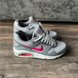 Gently used Girls youth size 4 Nike Air Max Navigate pink and grey